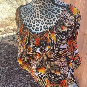 Let your wild side out! Off shoulder colorful top